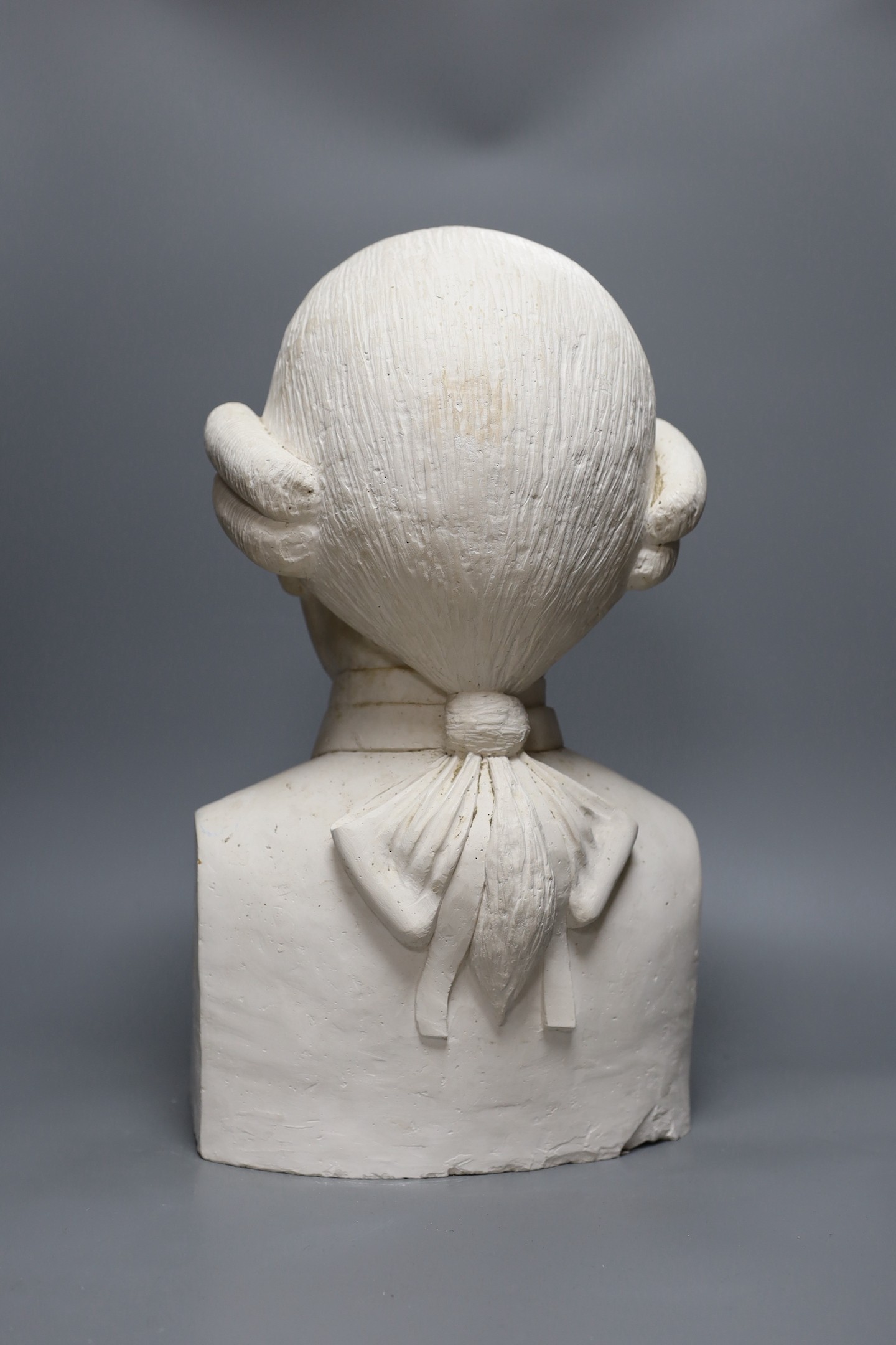 A plaster portrait bust of an 18th century gentleman, 45cm
